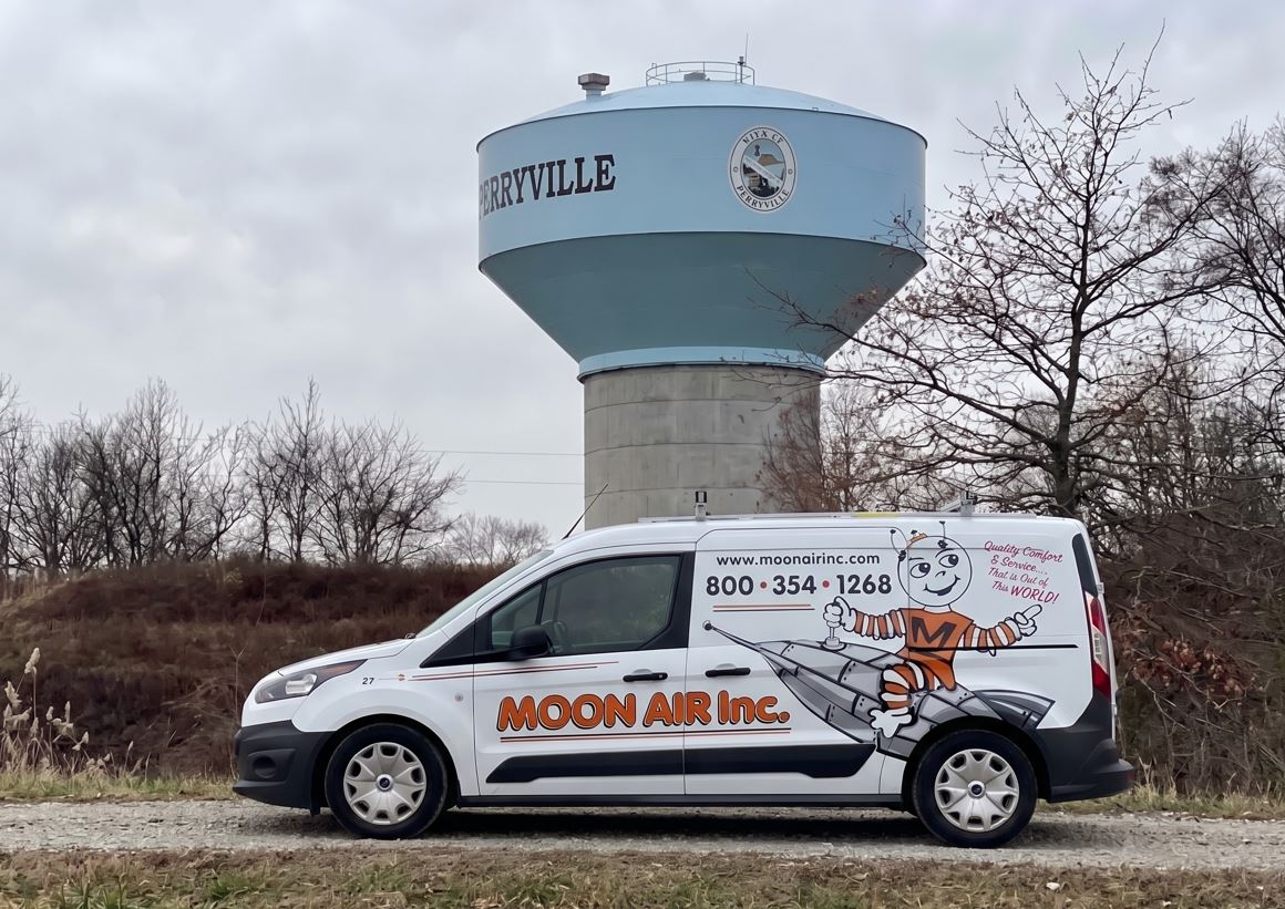 Moon Van In Front Of Elevated Water Tower In Perryville Md